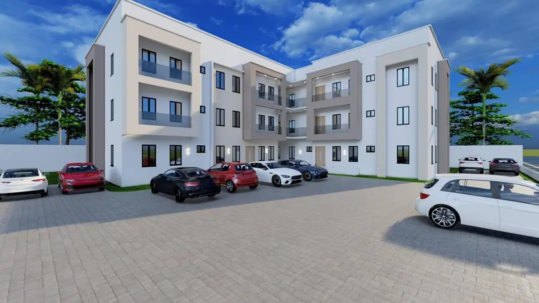 Architect's render of the Kaura District block with balconies, a paved courtyard and parked cars