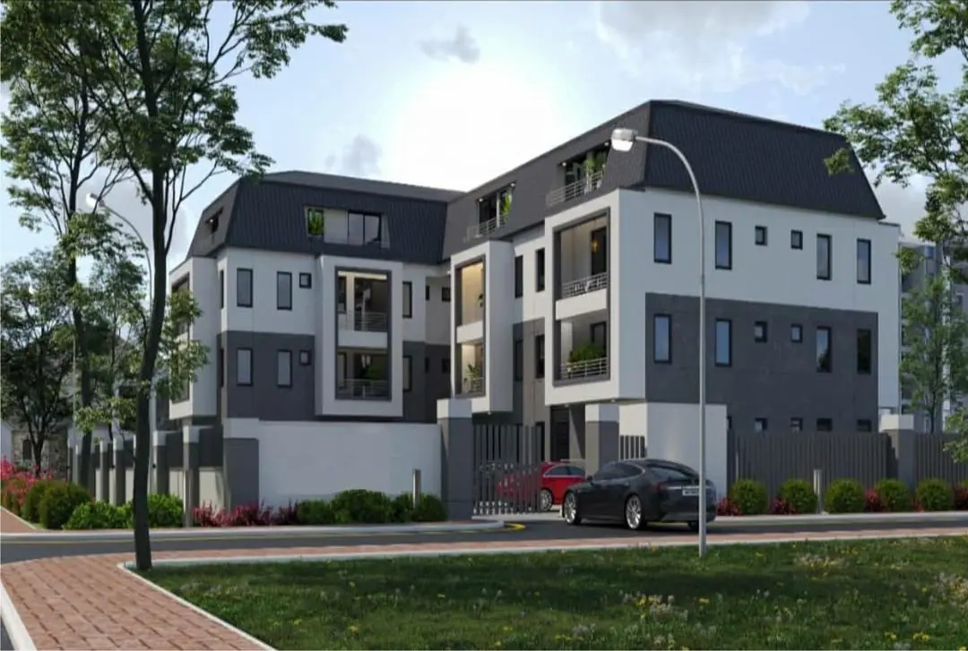 Render of a gated apartment block with a mansard roof and recessed balconies